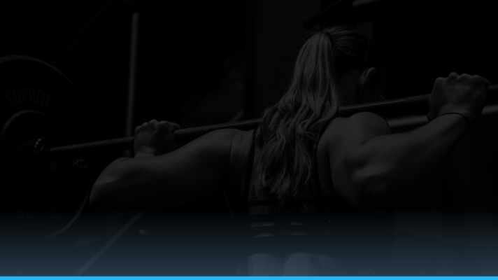 Woman doing back squat training